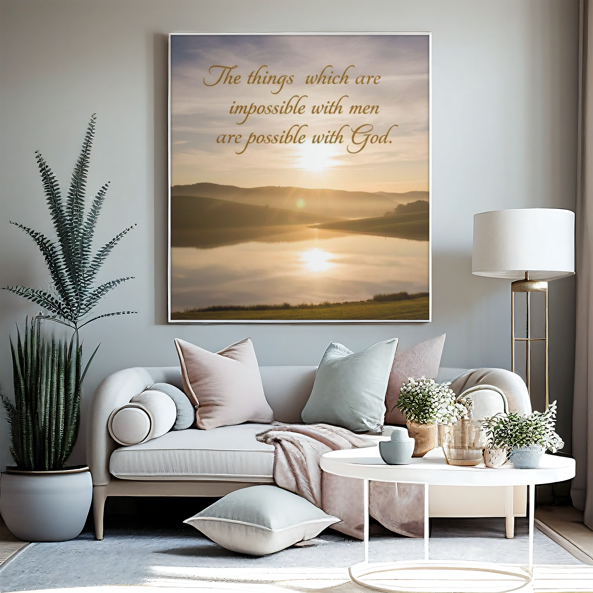 Living room with a couch, coffee table, and wall art featuring a sunset over a lake.
